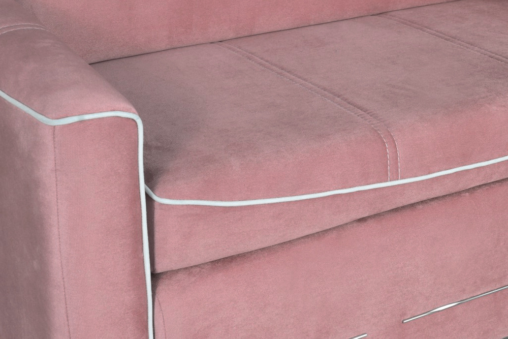 Marbella sofa bed in pink with white piping 